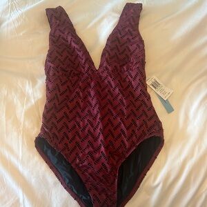 Antonio Melani NWT size 8. One piece suit, burgundy and black.